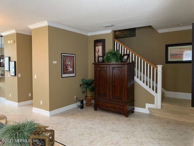 101 Hedgewood Drive St. Augustine, FL 32092 - Photo 4 of 27 a view of an entryway with wooden floor
