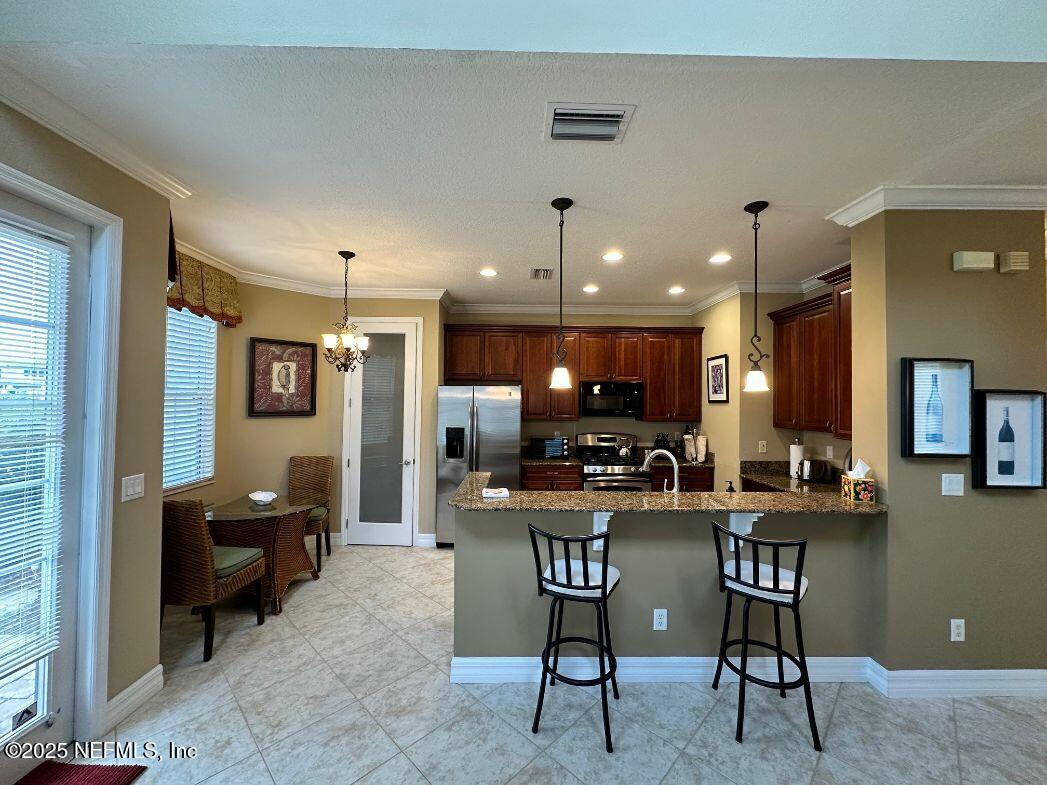 101 Hedgewood Drive St. Augustine, FL 32092 - Photo 8 of 27 a view of a living room and dining room