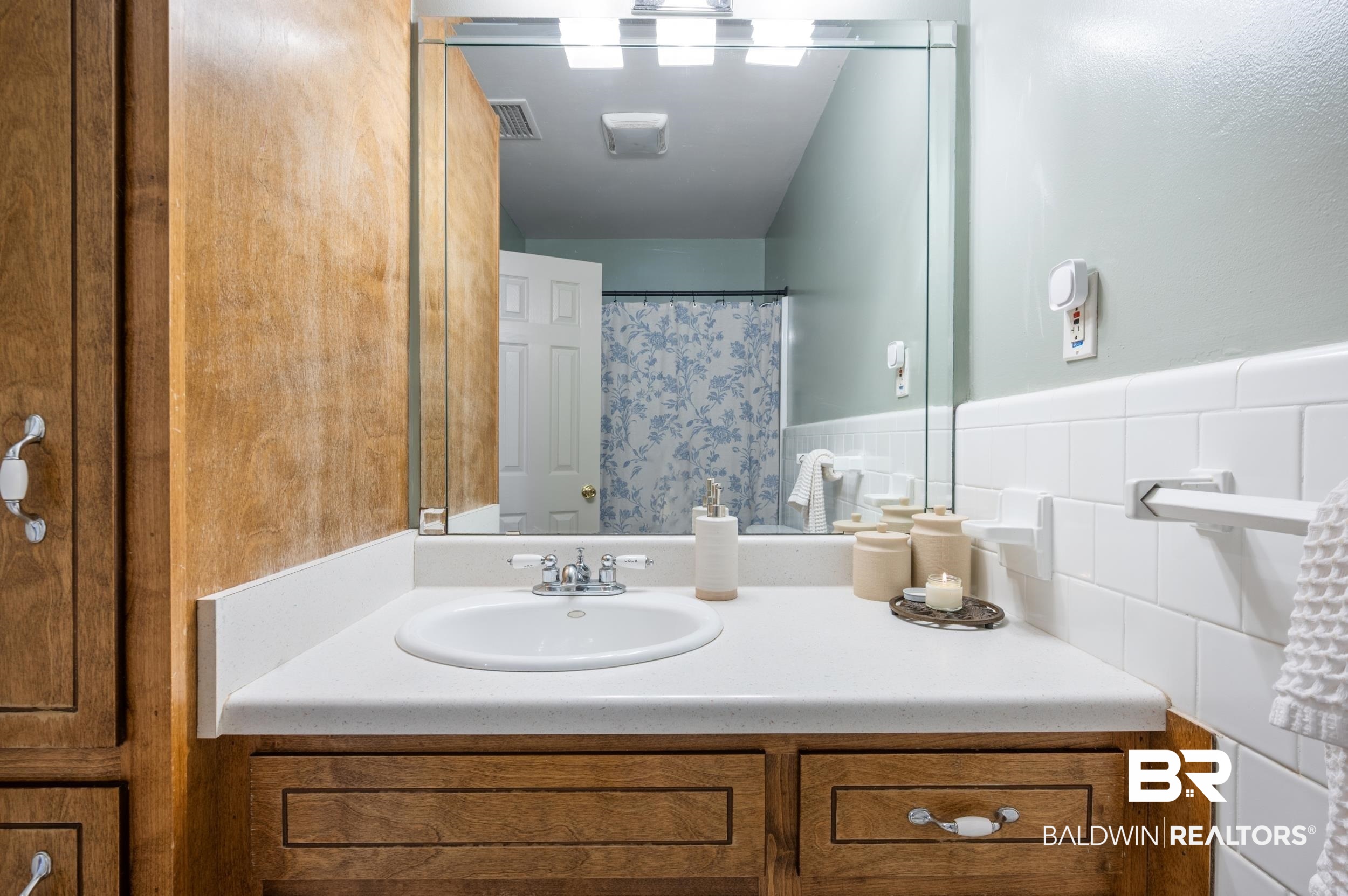 809 Moog Avenue Bay Minette, AL 36507 - Photo 25 of 33 Bathroom with vanity and a shower with shower curtain