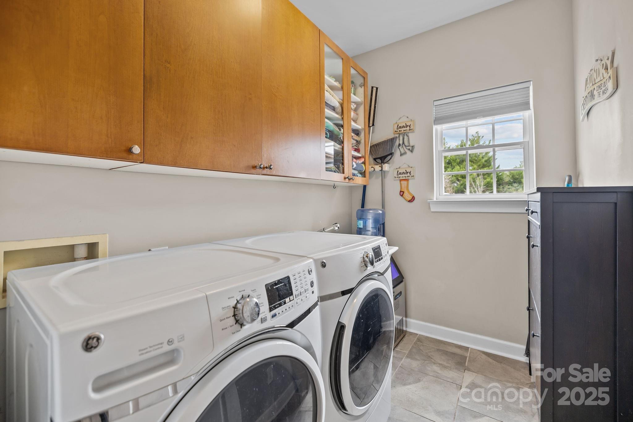 1002 Dataw Lane Indian Trail, NC 28079 - Photo 15 of 36 a utility room with dryer and washer