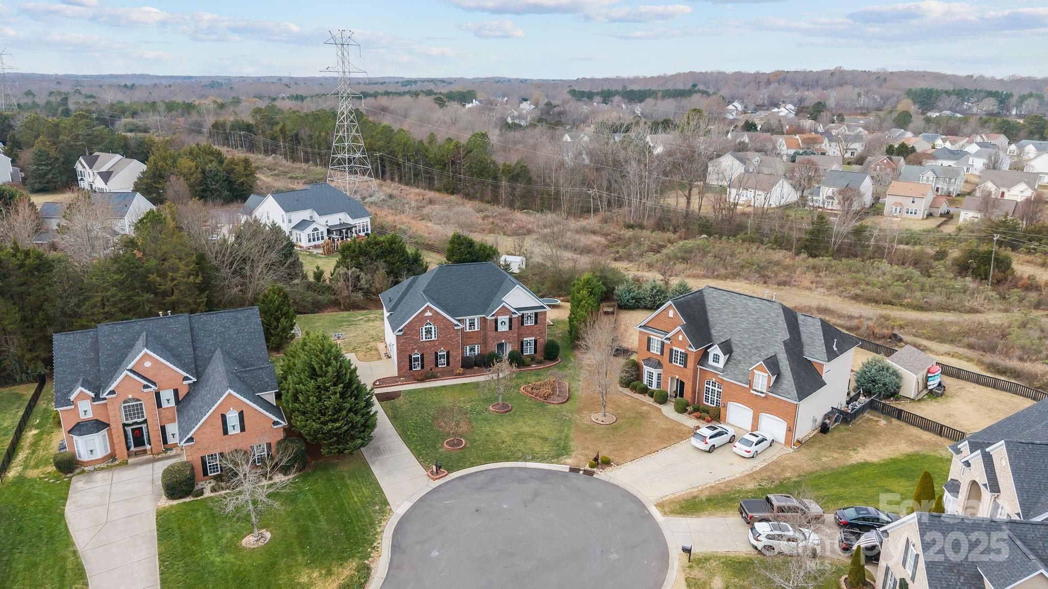 1002 Dataw Lane Indian Trail, NC 28079 - Photo 30 of 36 an aerial view of a house with pool patio and outdoor seating