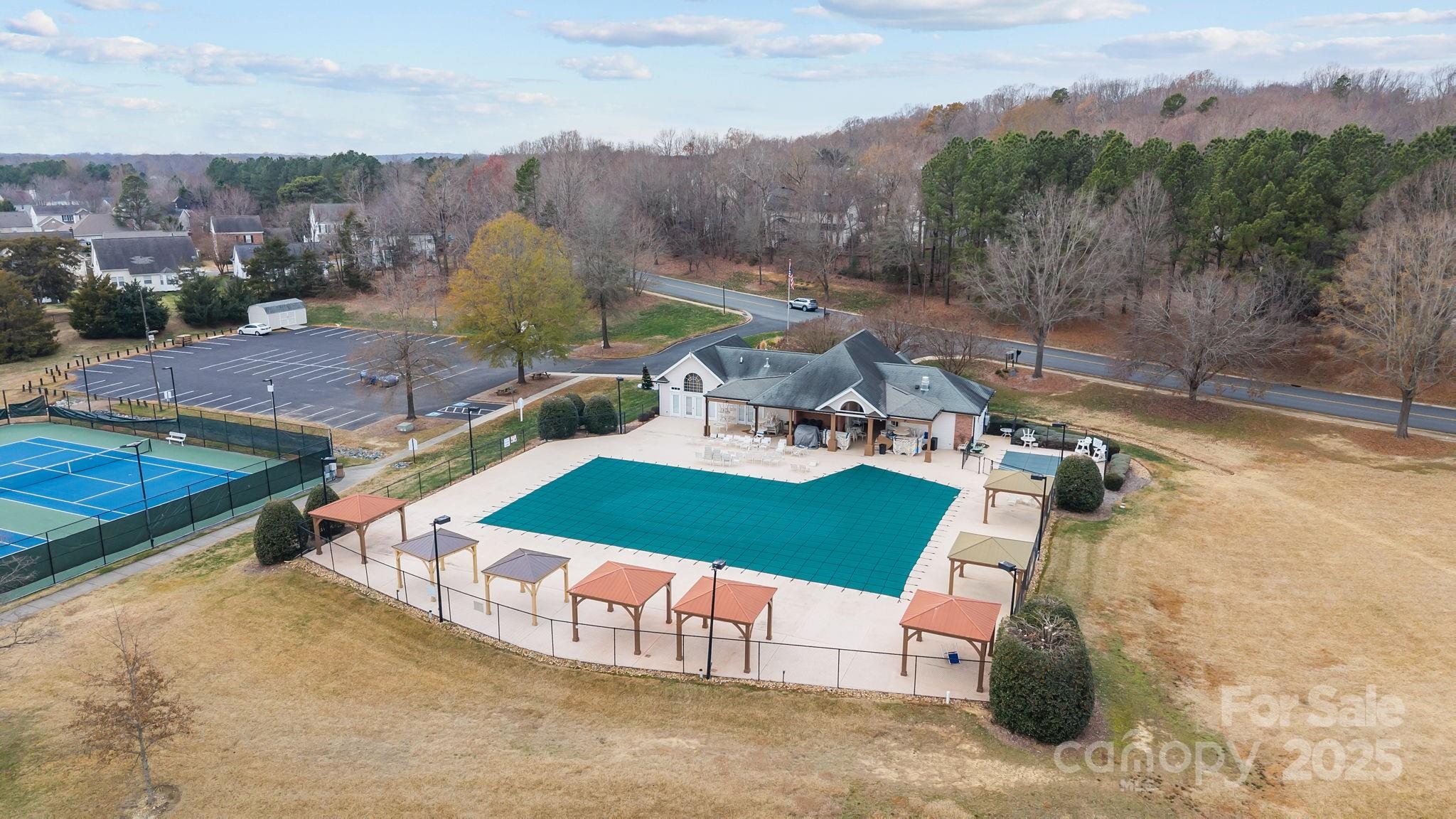 1002 Dataw Lane Indian Trail, NC 28079 - Photo 33 of 36 an aerial view of a house with a yard basket ball court and outdoor seating