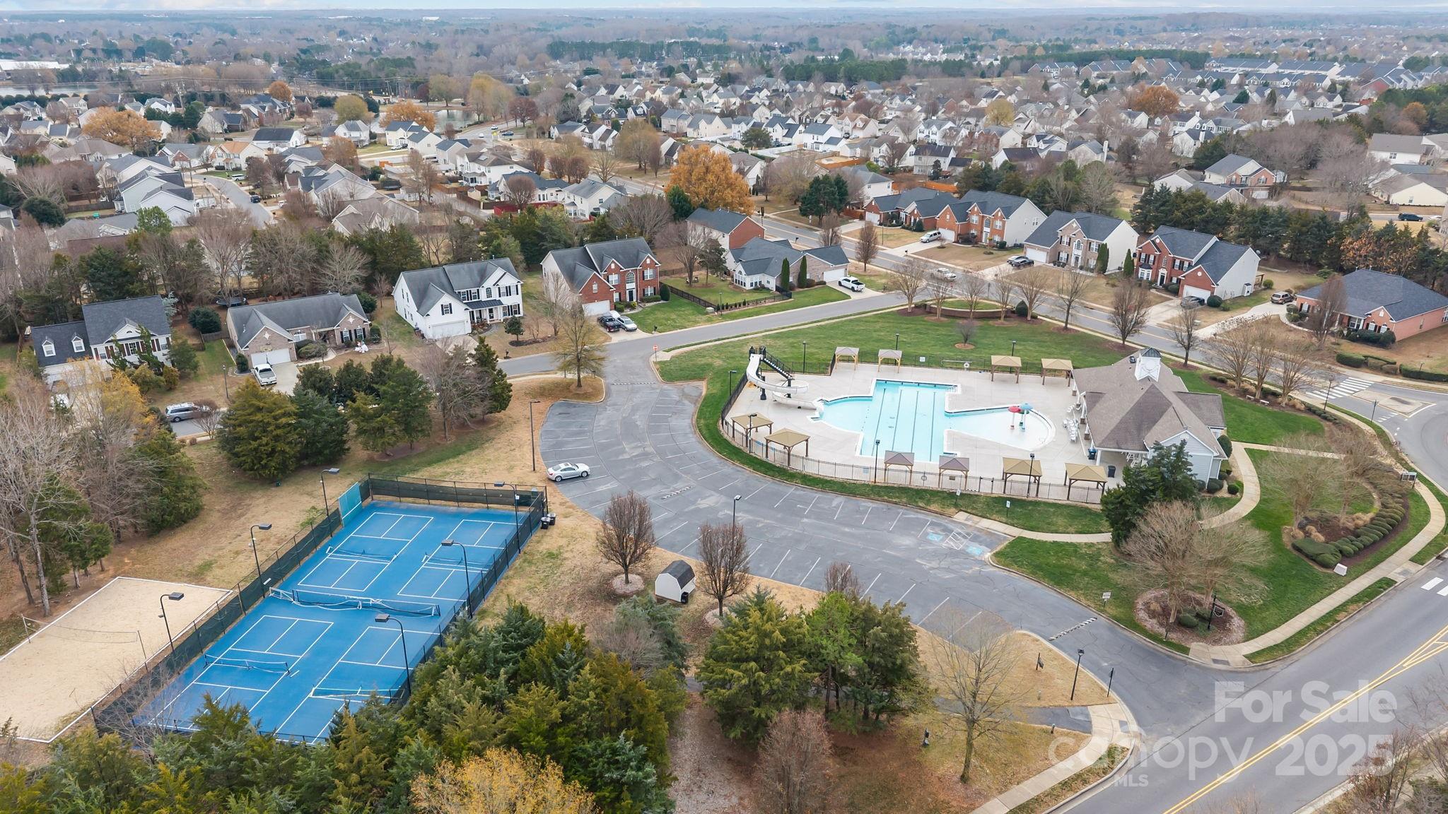 1002 Dataw Lane Indian Trail, NC 28079 - Photo 36 of 36 an aerial view of a house with yard swimming pool and outdoor seating
