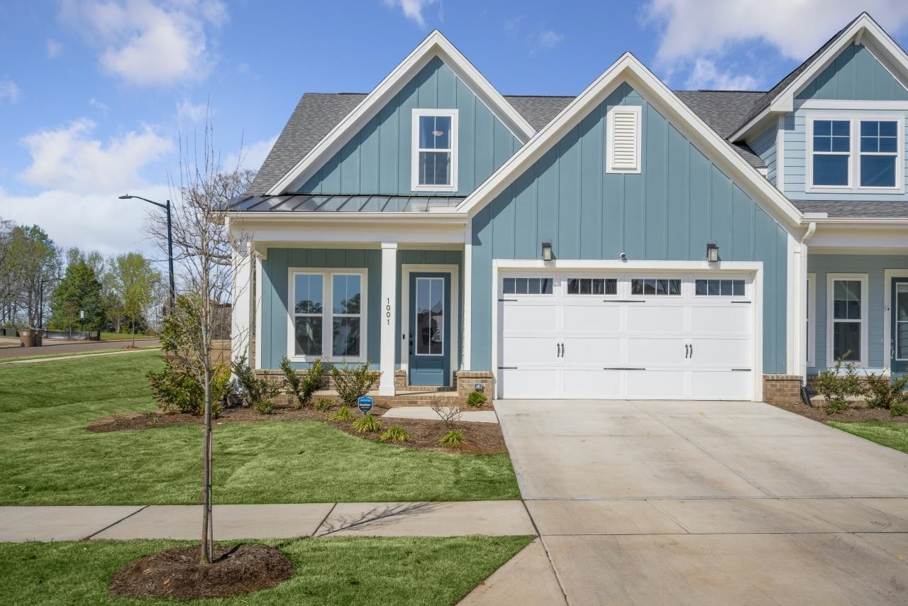 1001 Micato Way Wake Forest, NC 27587 - Photo 1 of 34 a front view of a house with a yard