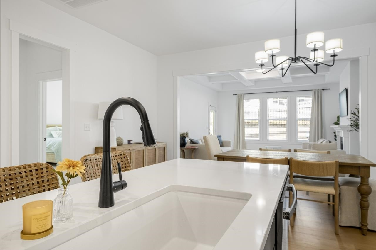 1001 Micato Way Wake Forest, NC 27587 - Photo 12 of 34 a spacious bathroom with a granite countertop sink a mirror and bathtub