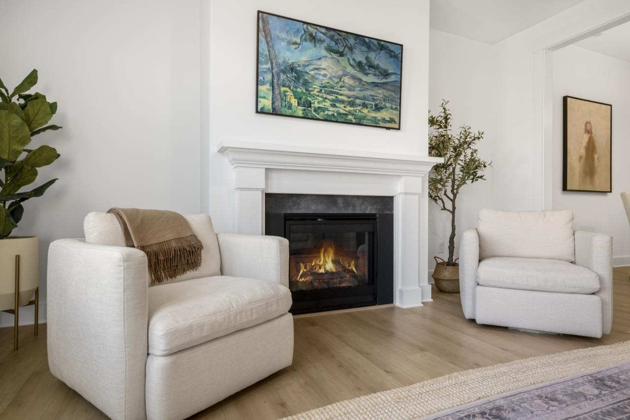 1001 Micato Way Wake Forest, NC 27587 - Photo 16 of 34 a living room with furniture and a fireplace