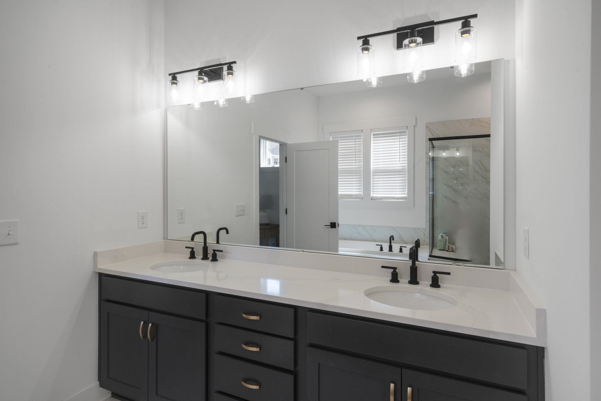 1001 Micato Way Wake Forest, NC 27587 - Photo 23 of 34 a bathroom with a double vanity sink mirror and