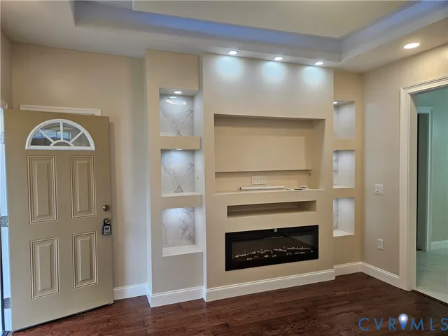 a living room with a fireplace