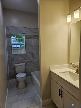 a bathroom with a sink and a toilet