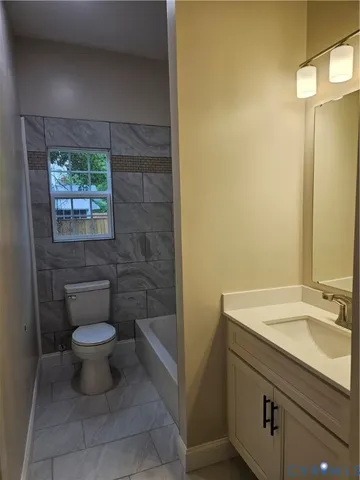 a bathroom with a sink and a toilet