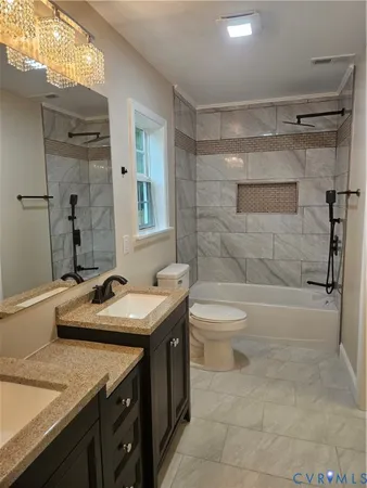 a bathroom with a sink vanity and mirror