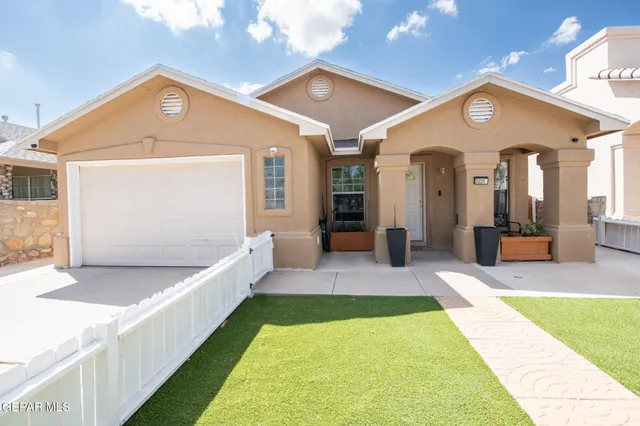 a front view of a house with swimming pool