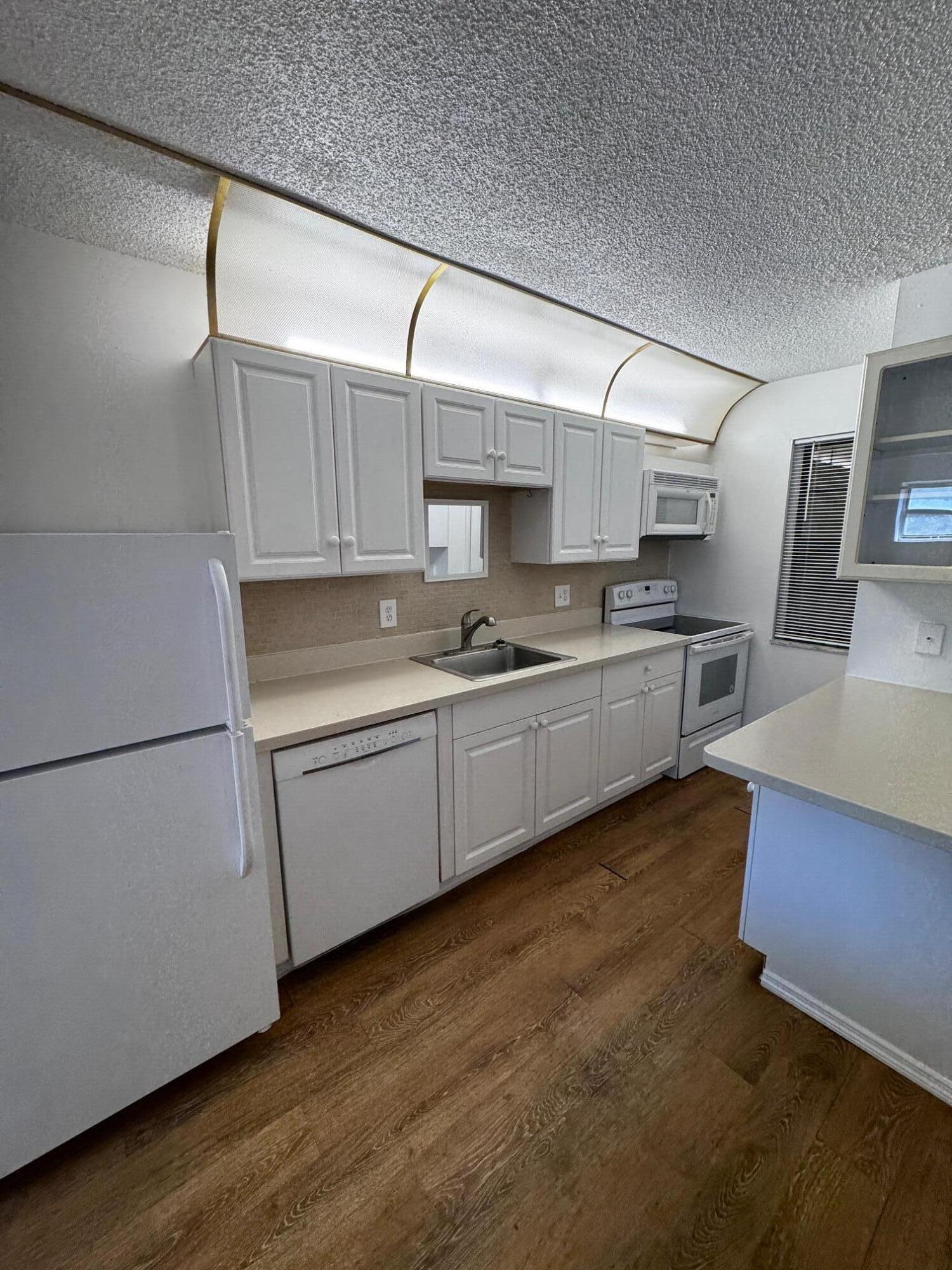 1021 Southeast Monterey Road, Unit 143 Stuart, FL 34994 - Photo 6 of 12 IMG_4660