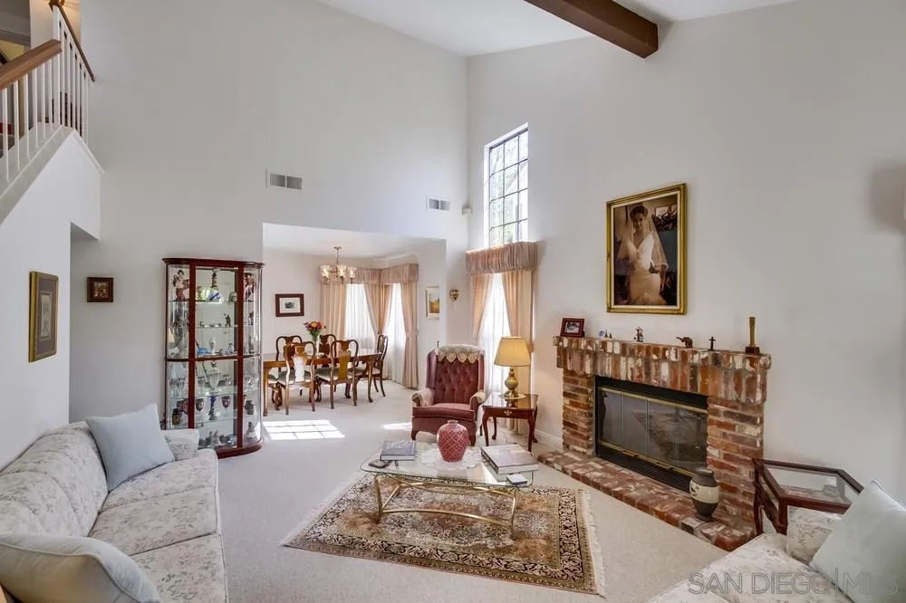 13354 Benchley Road San Diego, CA 92130 - Photo 18 of 24 a living room with furniture and wooden floor