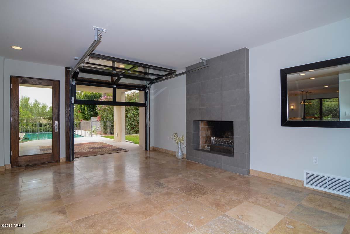 5409 East Camello Road Phoenix, AZ 85018 - Photo 9 of 45 Great Room-Roll Up Door.jpg