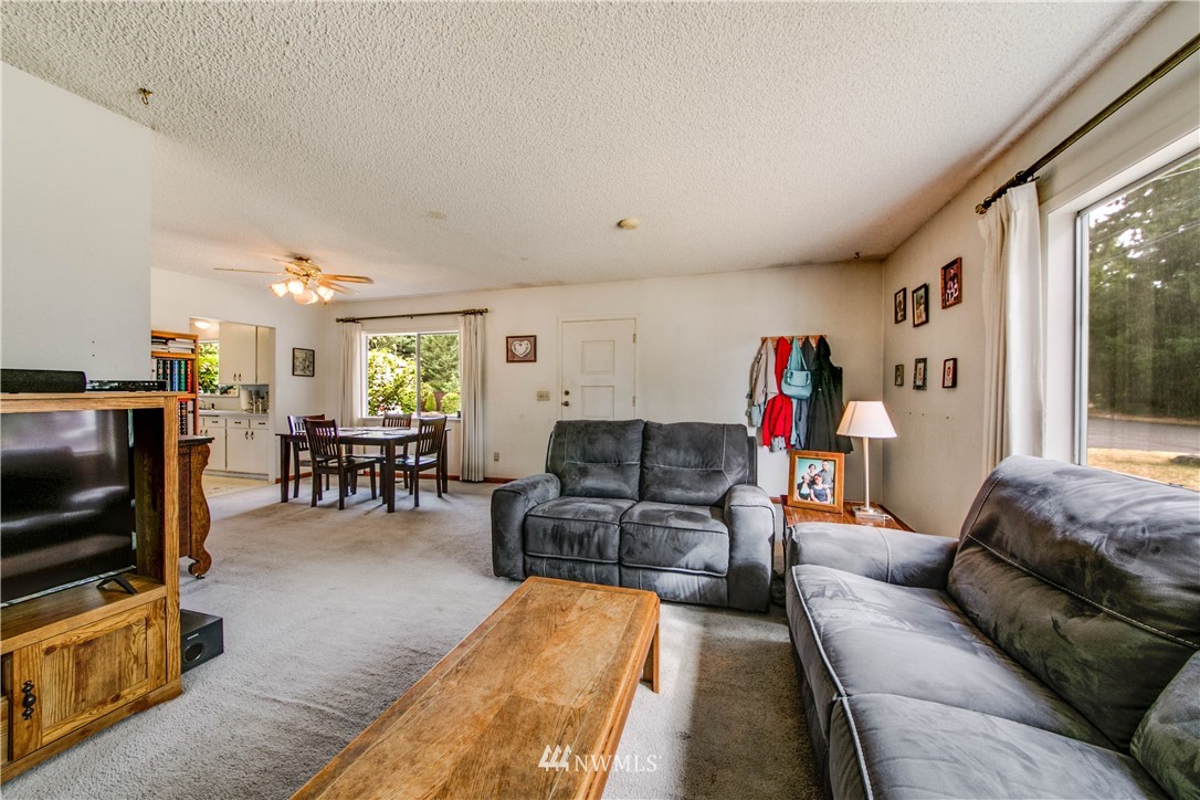 902 South Mullen Street Tacoma, WA 98405 - Photo 13 of 30 a living room with furniture and a flat screen tv