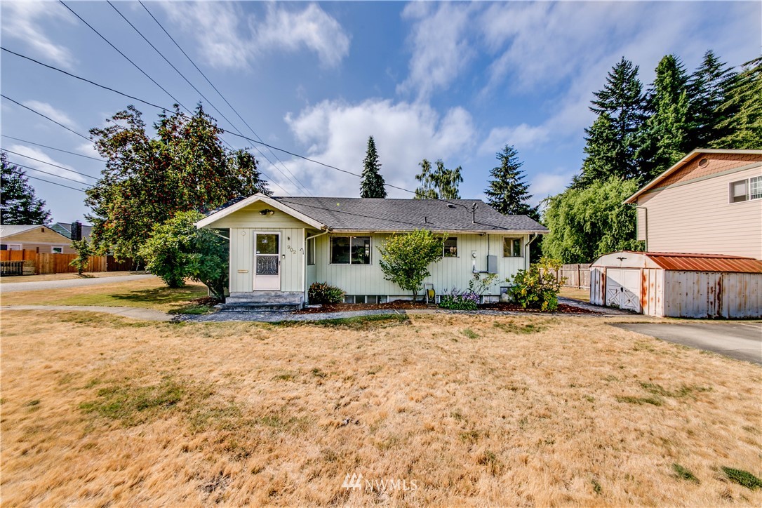 902 South Mullen Street Tacoma, WA 98405 - Photo 3 of 30 a view of a house with a patio