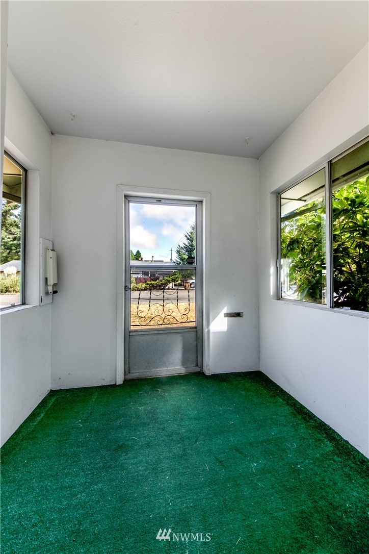902 South Mullen Street Tacoma, WA 98405 - Photo 6 of 30 a view of room with window and outdoor space