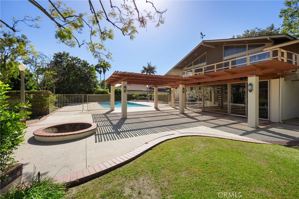 8780 Hillcrest Road Buena Park, CA 90621 - Photo 11 of 62 a view of a house with pool and chairs
