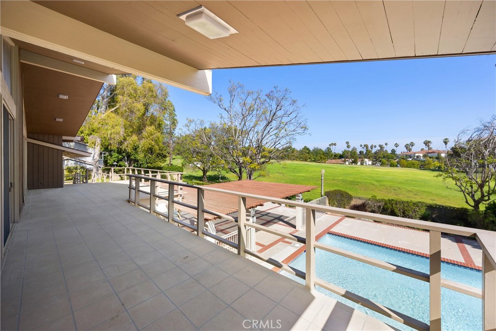 8780 Hillcrest Road Buena Park, CA 90621 - Photo 18 of 62 a view of a swimming pool with a outdoor seating