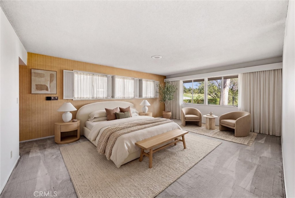 8780 Hillcrest Road Buena Park, CA 90621 - Photo 44 of 62 a bed room with a bed and a couch