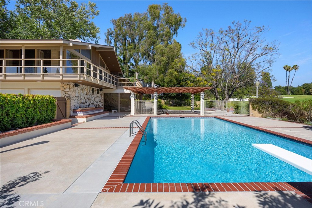 8780 Hillcrest Road Buena Park, CA 90621 - Photo 9 of 62 a view of a house with swimming pool