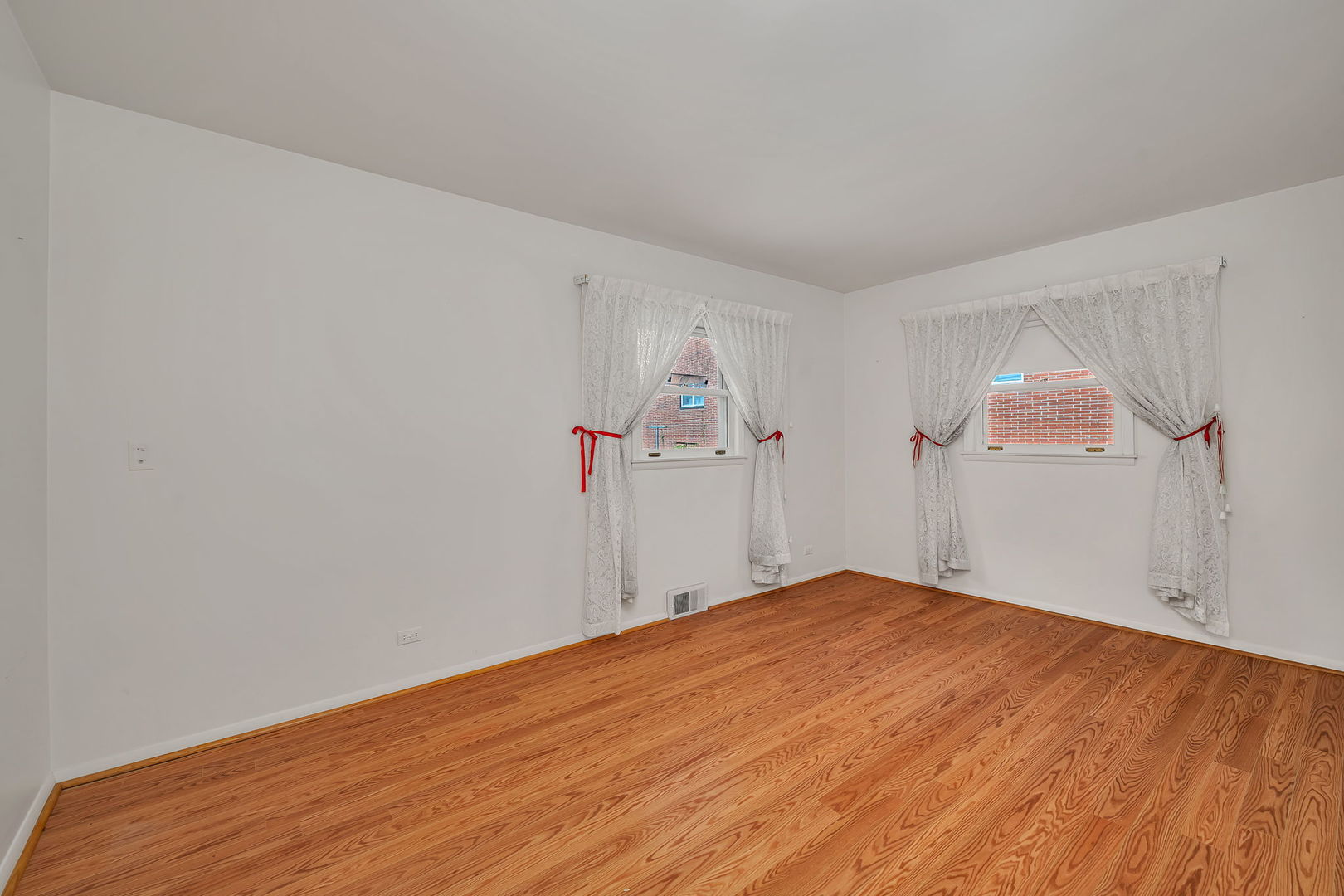409 West Jefferson Street Morris, IL 60450 - Photo 14 of 44 a view of a room with wooden floor