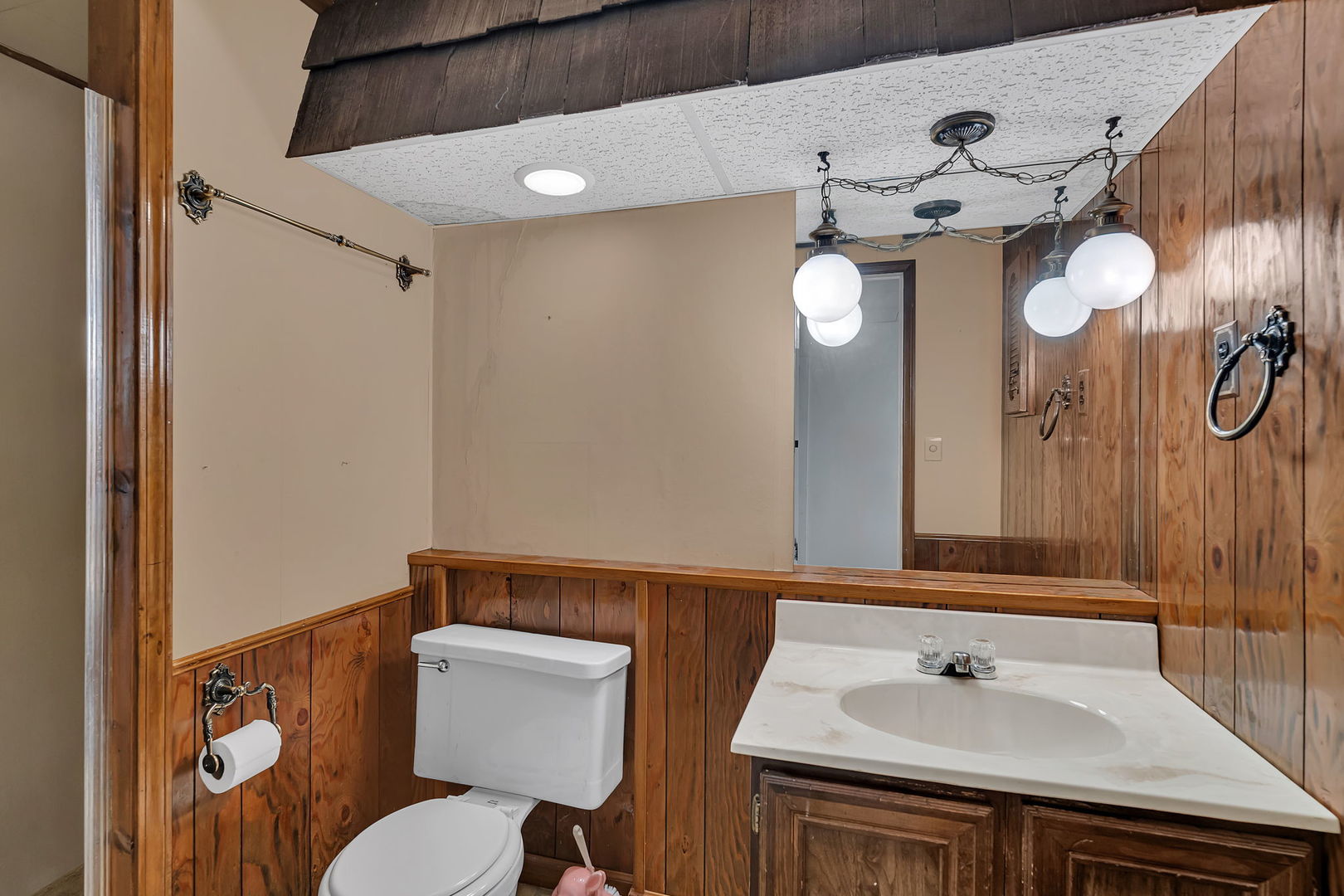 409 West Jefferson Street Morris, IL 60450 - Photo 23 of 44 a bathroom with a sink mirror and toilet