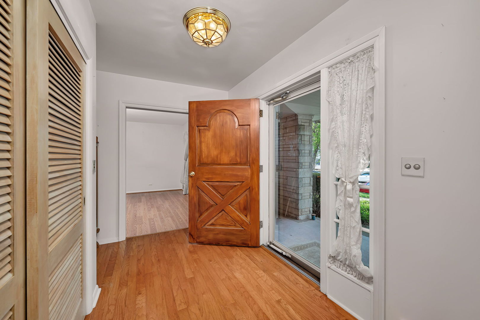 409 West Jefferson Street Morris, IL 60450 - Photo 44 of 44 an empty room with wooden floor