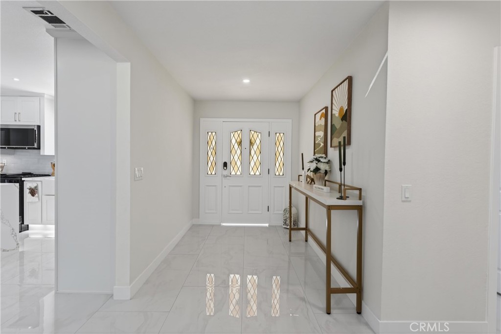 11891 San Timoteo Canyon Road Redlands, CA 92373 - Photo 17 of 68 a view of a hallway with bathroom