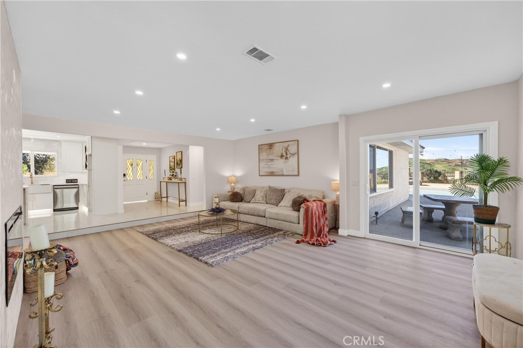 11891 San Timoteo Canyon Road Redlands, CA 92373 - Photo 23 of 68 a living room with furniture and a table