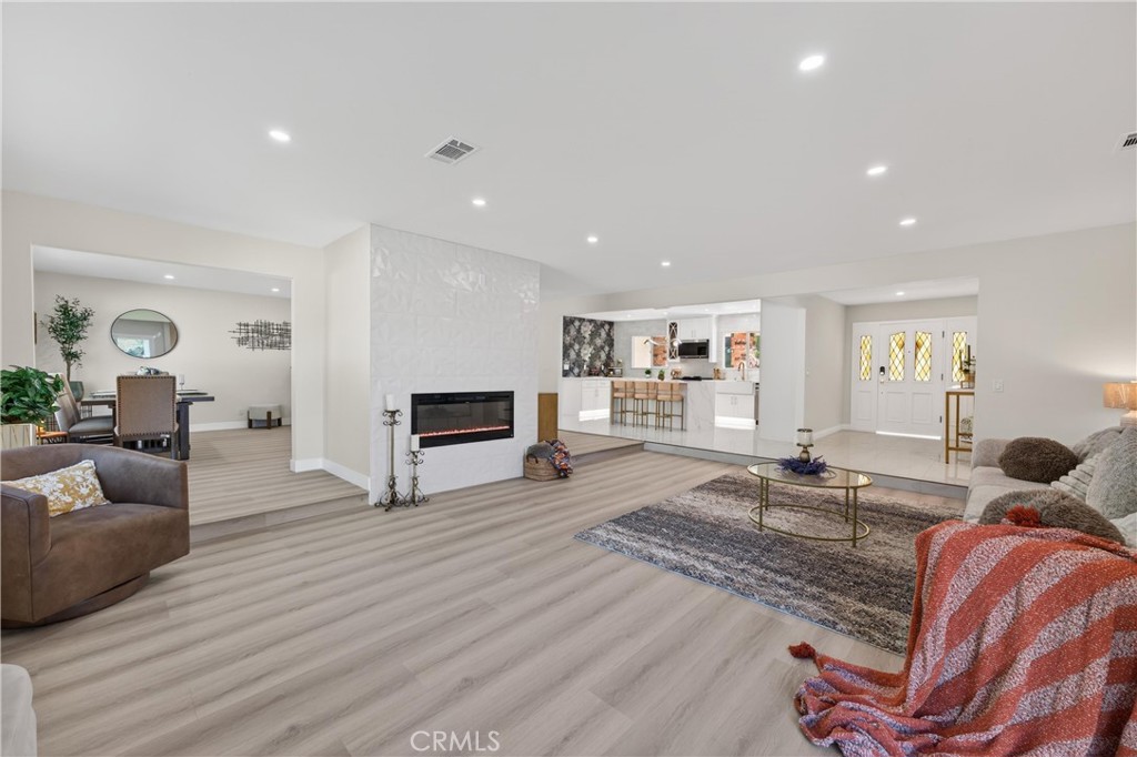 11891 San Timoteo Canyon Road Redlands, CA 92373 - Photo 27 of 68 a living room with furniture and a wooden floor
