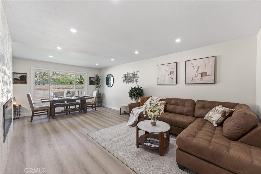 11891 San Timoteo Canyon Road Redlands, CA 92373 - Photo 29 of 68 a living room with furniture and wooden floor