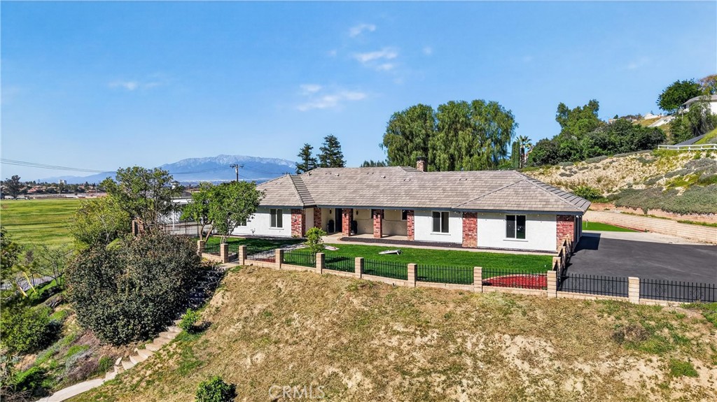 11891 San Timoteo Canyon Road Redlands, CA 92373 - Photo 4 of 68 front view of a house with a yard