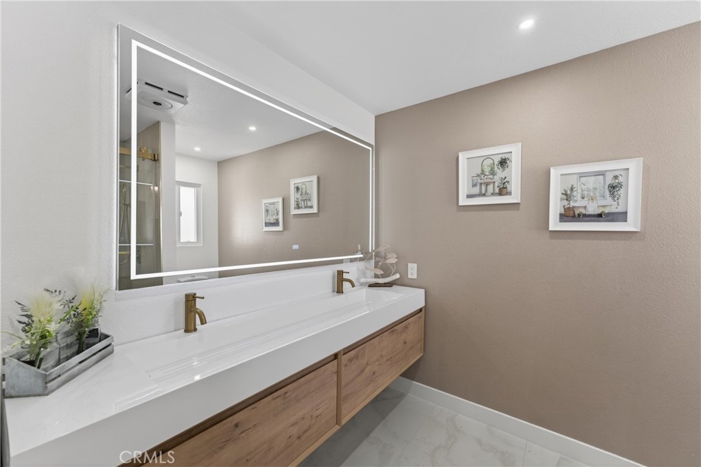 11891 San Timoteo Canyon Road Redlands, CA 92373 - Photo 45 of 68 a bathroom with a sink and a mirror