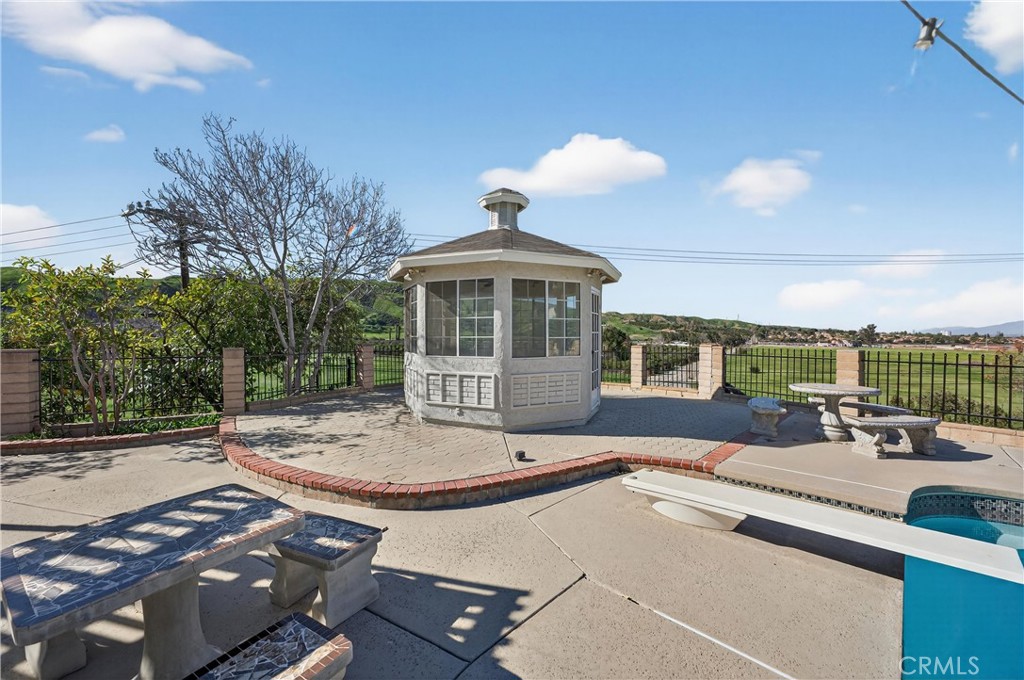 11891 San Timoteo Canyon Road Redlands, CA 92373 - Photo 56 of 68 a view of a house with backyard and sitting area