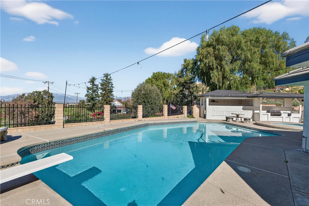 11891 San Timoteo Canyon Road Redlands, CA 92373 - Photo 59 of 68 a view of a swimming pool with lounge chair