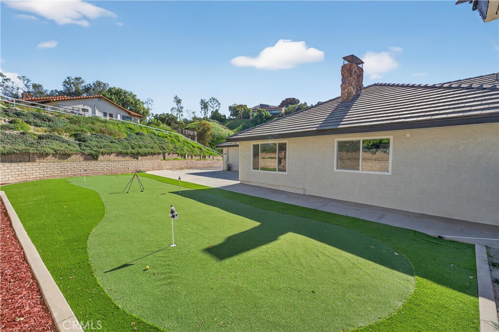 11891 San Timoteo Canyon Road Redlands, CA 92373 - Photo 6 of 68 a view of a house with a backyard and a window
