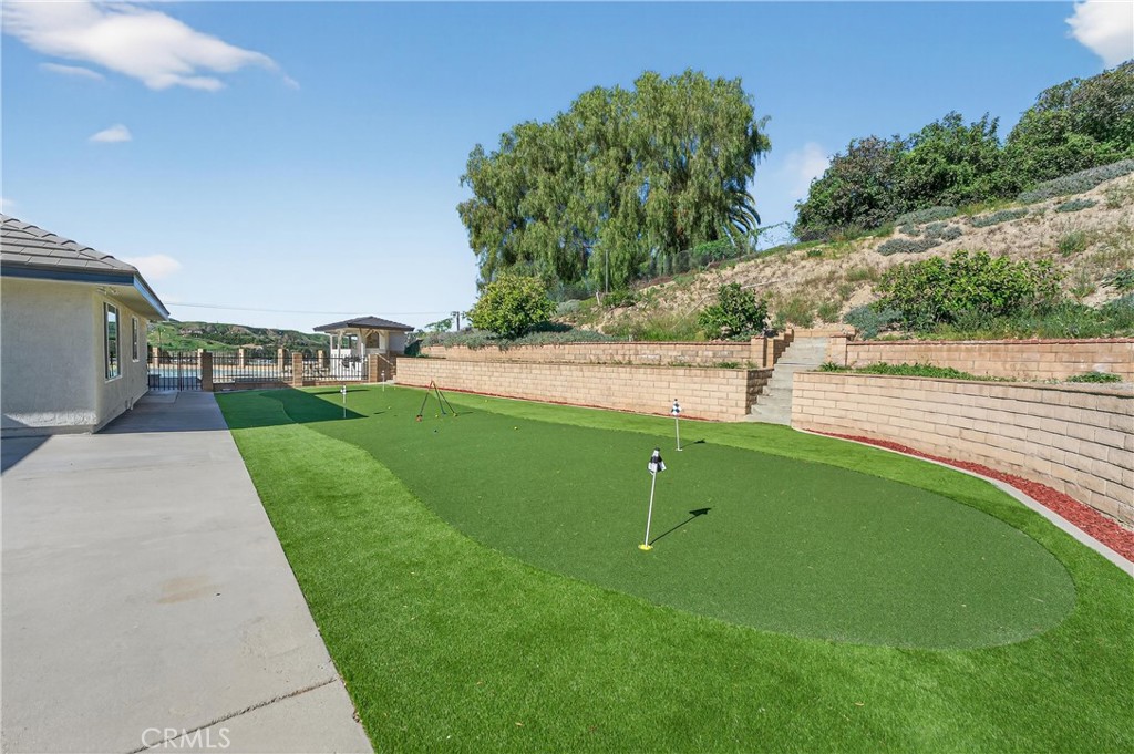 11891 San Timoteo Canyon Road Redlands, CA 92373 - Photo 61 of 68 a view of a golf course with a lake