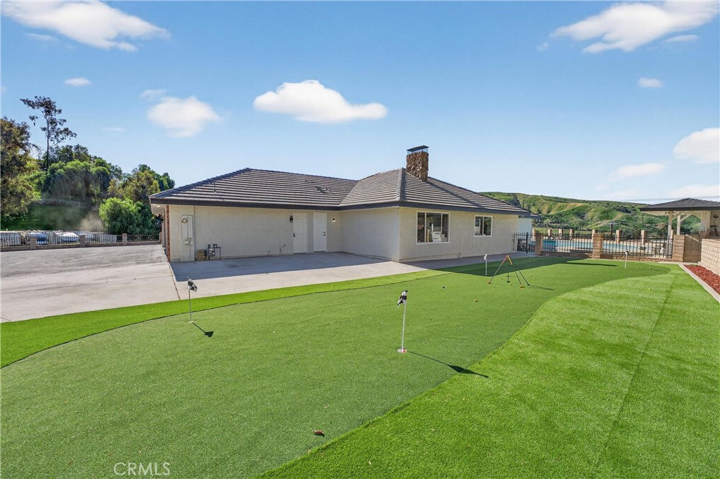 11891 San Timoteo Canyon Road Redlands, CA 92373 - Photo 63 of 68 a front view of a house with a yard