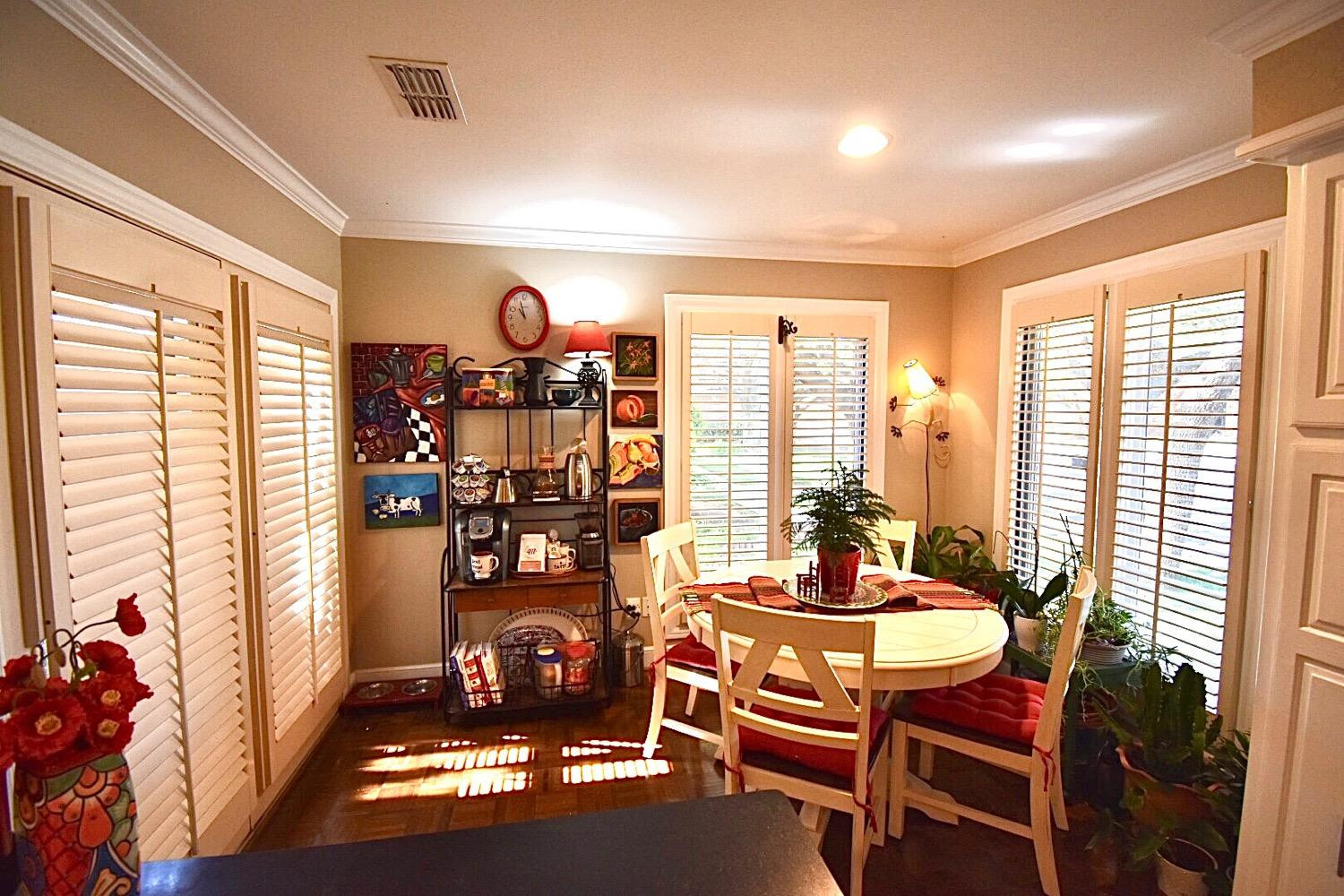 8201 Durham Avenue Lubbock, TX 79424 - Photo 15 of 33 a view of a dining room with furniture and window