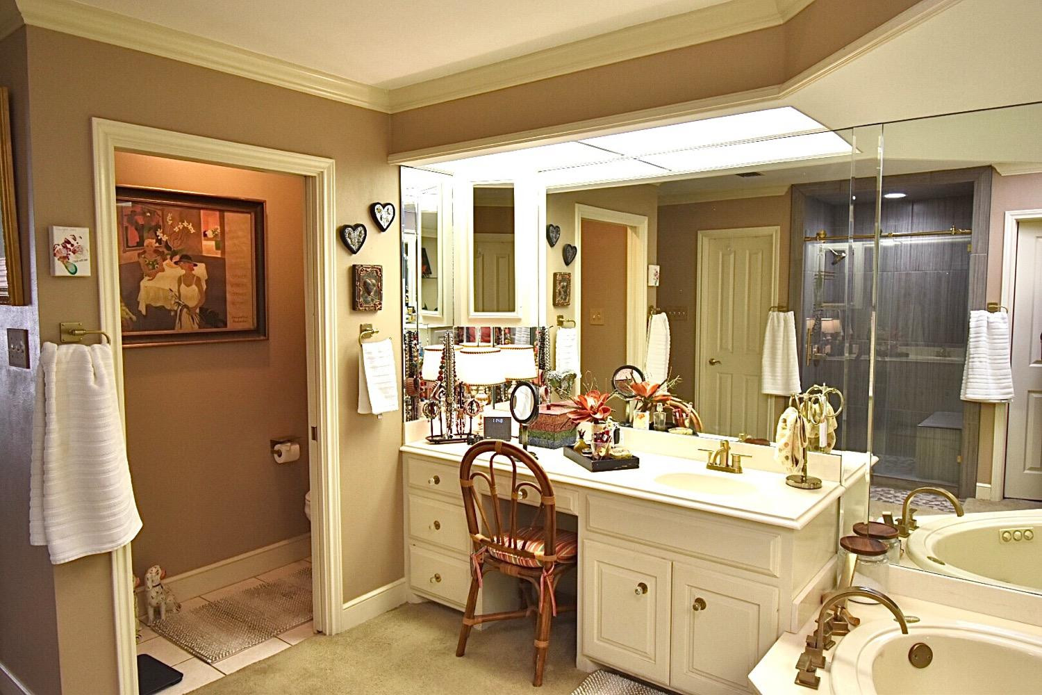8201 Durham Avenue Lubbock, TX 79424 - Photo 31 of 33 a bathroom with a sink double vanity