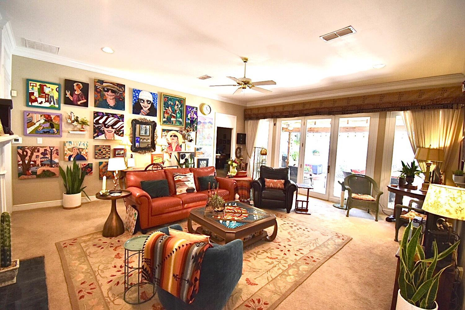 8201 Durham Avenue Lubbock, TX 79424 - Photo 8 of 33 a living room with furniture kitchen view and large windows