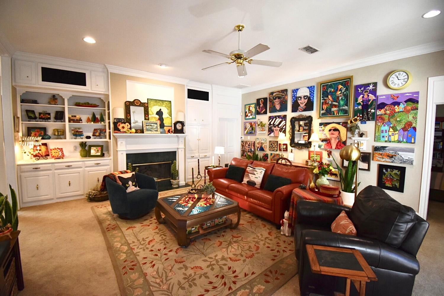 8201 Durham Avenue Lubbock, TX 79424 - Photo 9 of 33 a living room with furniture fireplace and flat screen tv