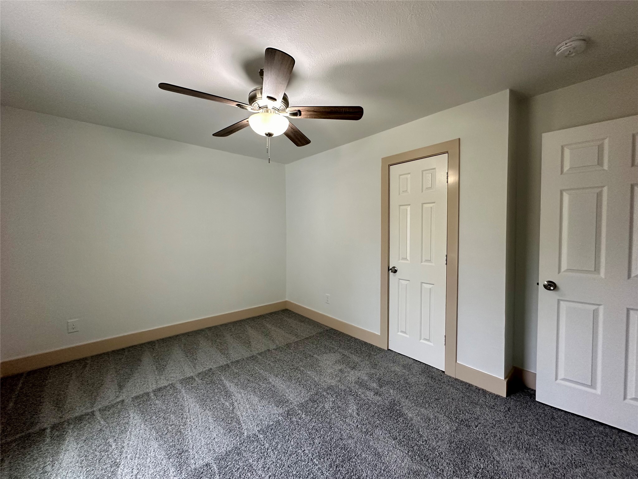 4613 Dewberry Street Houston, TX 77021 - Photo 14 of 17 an empty room with a window and a fan