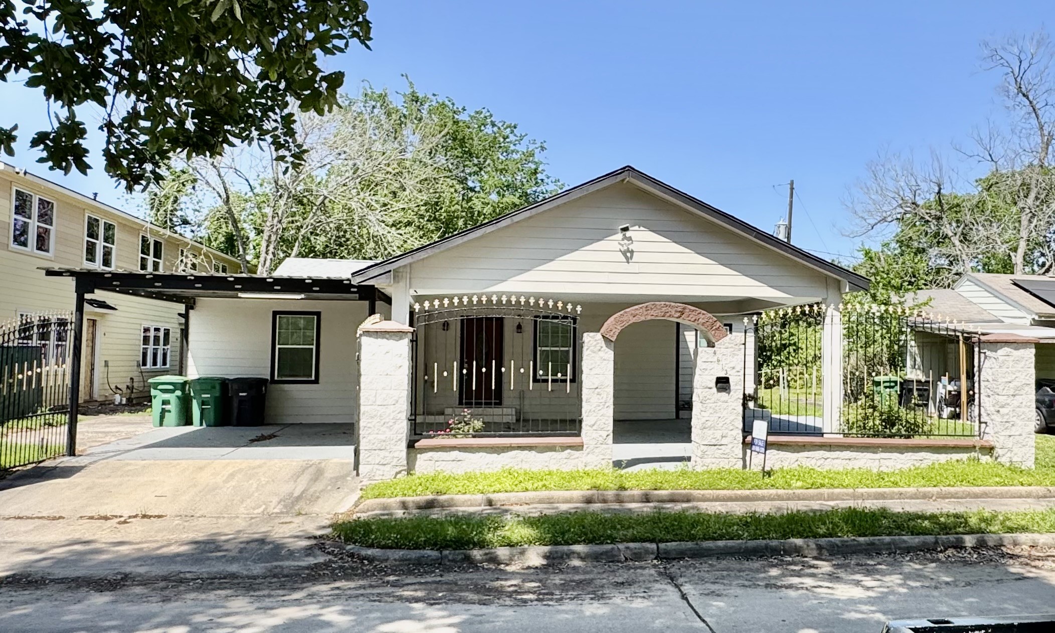 4613 Dewberry Street Houston, TX 77021 - Photo 2 of 17 a front view of a house with a yard