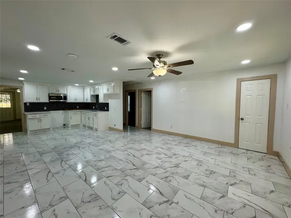 a view of a kitchen with a sink
