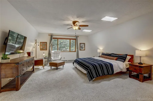 a view of a livingroom with furniture and window