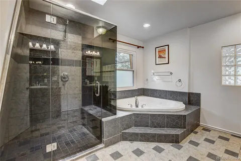 a white bath tub sitting next to a window