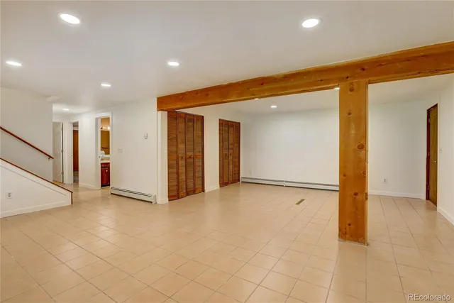 a view of a livingroom with a staircase